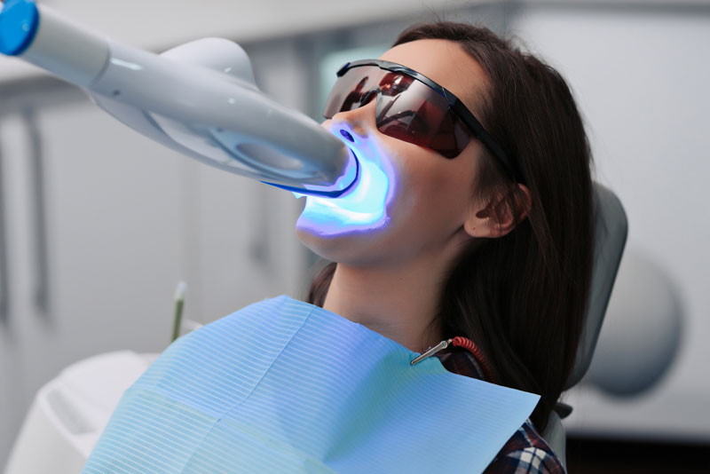 a dental patient undergoing professional teeth whitening.